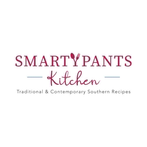 Logo for "Smarty Pants Kitchen" featuring text in red and pink with a fork and spoon forming part of the letters. Below, it reads "Traditional & Contemporary Southern Recipes.