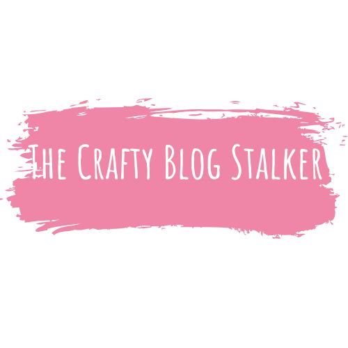 Text reading "The Crafty Blog Stalker" is overlaid on a rough pink brushstroke background.